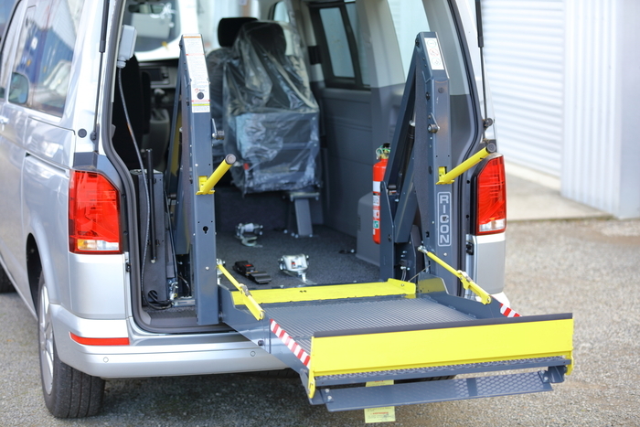 K2005 wheelchair hoist extended from van