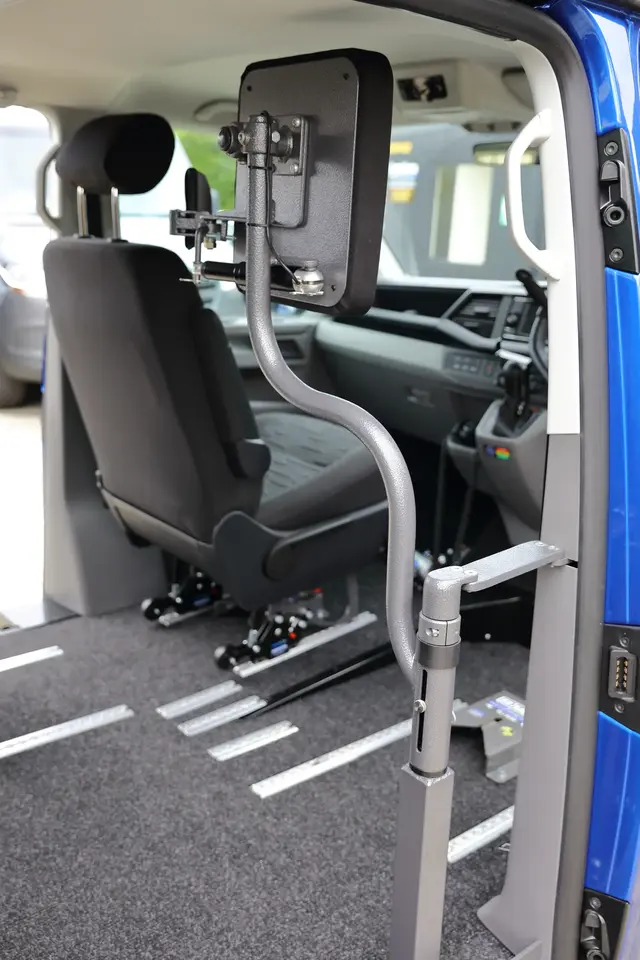 Headrest for driver in wheelchair