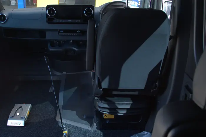 Driving aid lever beside drivers chair